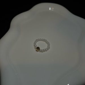 pearl and gold rings